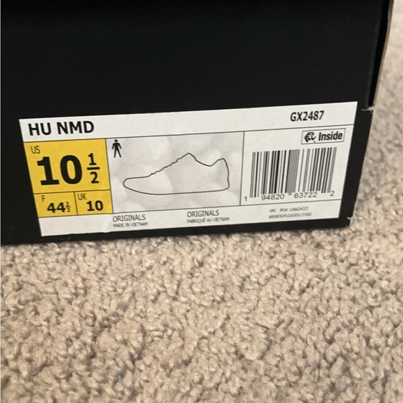 nmd human race triple black